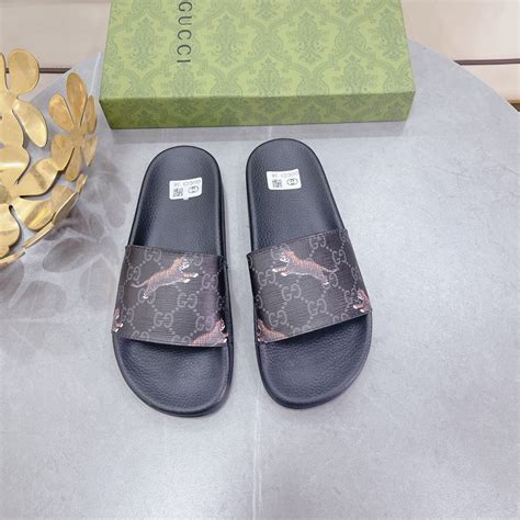 black tiger gucci slides|Gucci slide g0k00 1084.